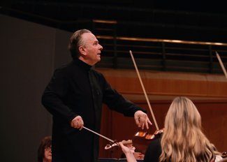 Sir Mark Elder conducting the Hallé